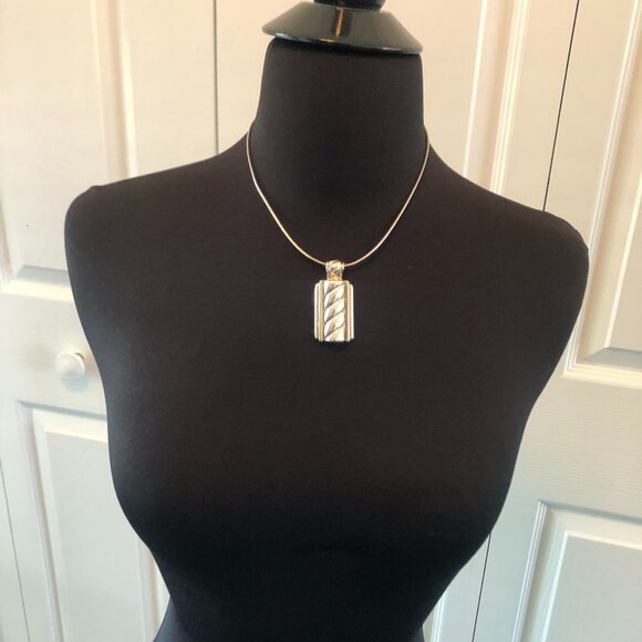 Silver colored oblong pendant 2 in by 1 in - light gold trim - Picture 1 of 9